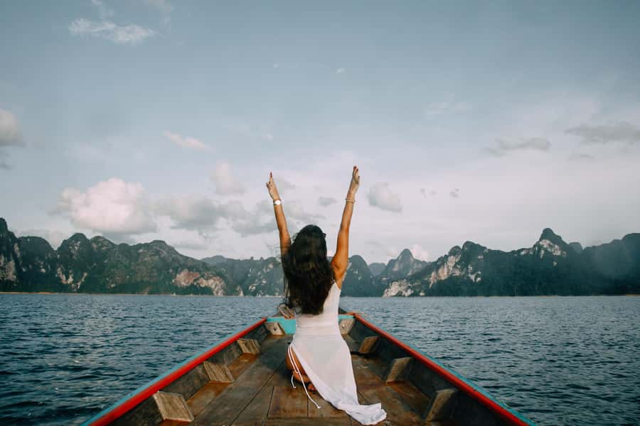 2 Days Khao Sok with Overnight at Cheow Lan Lake Raft House - Longtail boat views from Ratchaprapa Dam