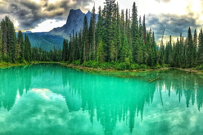 8 Iconic Stops. 12 Comfy Seats. See Banff's Best in First Class. - Moraine Lake or Emerald Lake, depending on the calendar