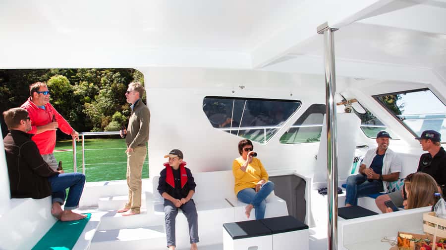 Abel Tasman National Park: Sailing and Self-Guided Walk - The crew, boat, and group feel