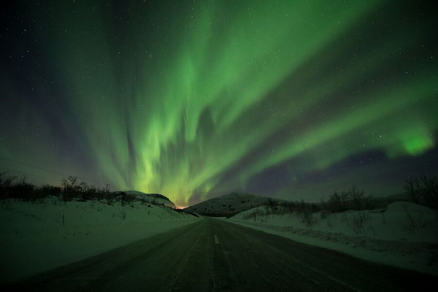 Abisko: Guided Aurora Chase with Hotel Transfers - Warm transport makes repeated stops easier