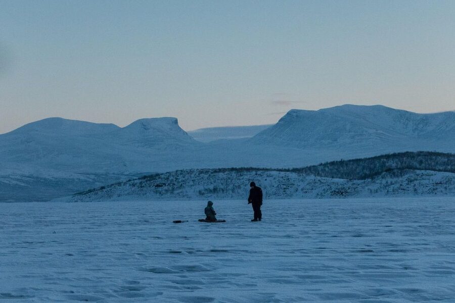 Abisko: Lake Torneträsk Arctic Ice Fishing Trip - Learning to drill, lure, and wait