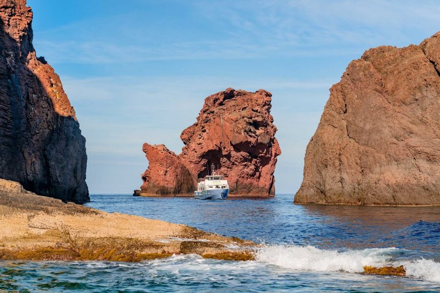 Ajaccio/Porticcio: Scandola Nature Reserve Guided Boat Tour - Capo Rosso Tower and the final coastal views