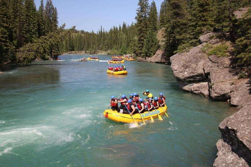 Banff: Afternoon Kananaskis River Whitewater Rafting Tour - On the river: calm water, rapids, and mountain views
