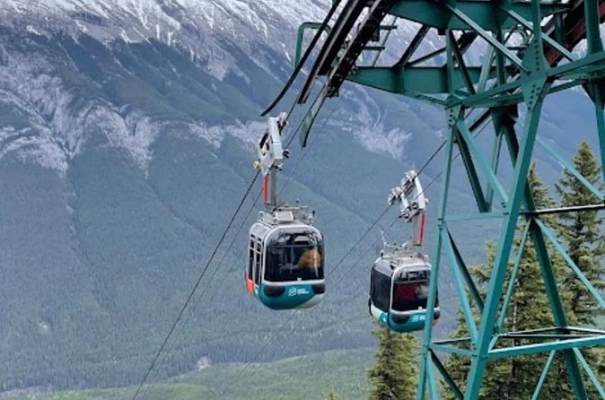 Banff Gondola Hot Springs Bow Falls and Three Lakes tour - The Banff sign makes a simple final photograph