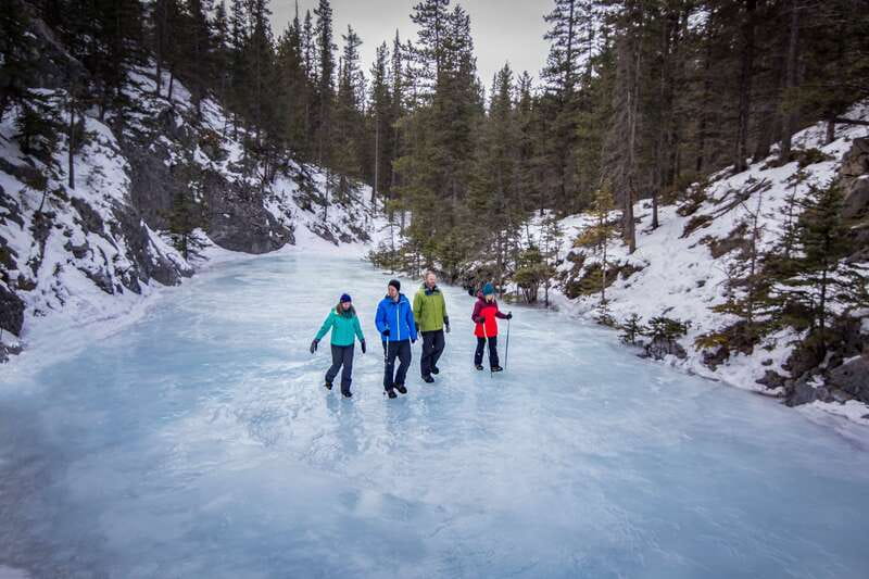 Banff: Grotto Canyon Icewalk - Ice cleats, poles, and the first steps on the creek