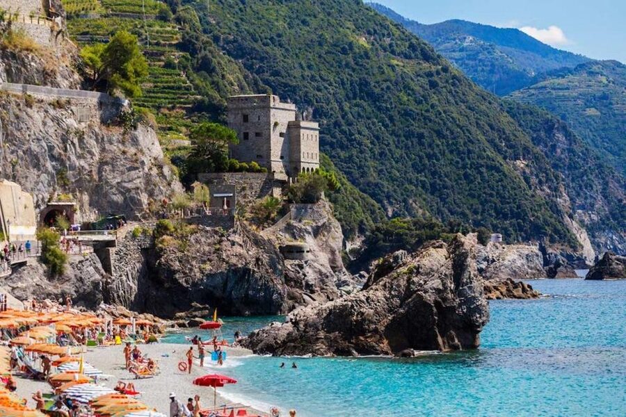 Cinque Terre: Hybrid Boat Tour with Swimming Stop - Corniglia above the water