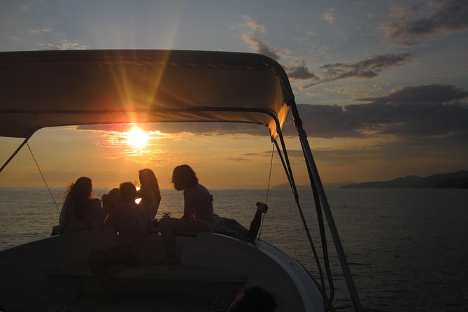 Cinque Terre Sunset Boat Tour Experience - Leaving Monterosso and meeting the coast