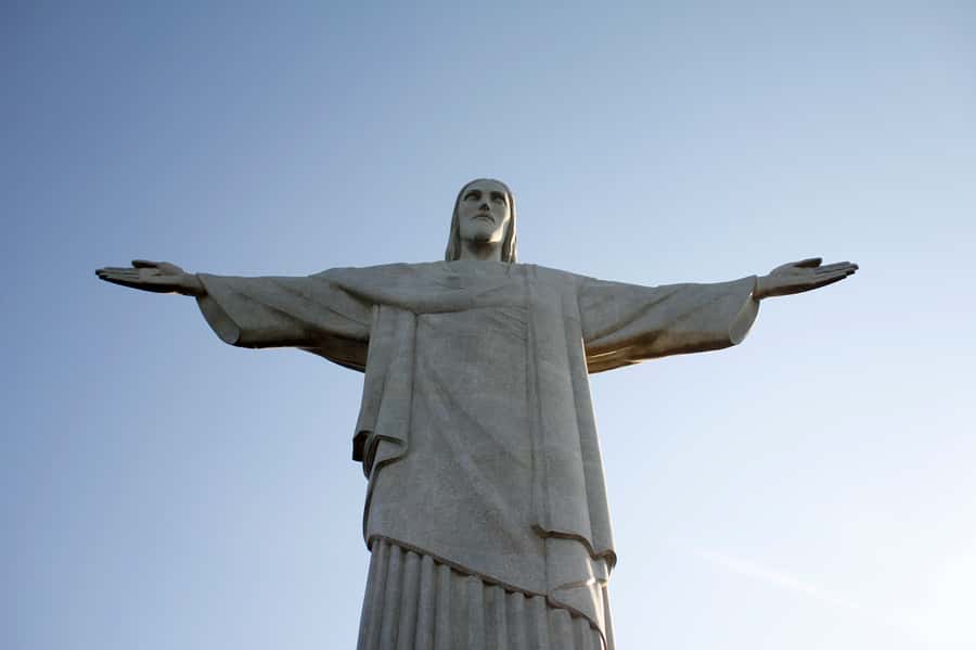 Corcovado and Sugarloaf Mountain Full-Day Tour - Christ the Redeemer above the rainforest