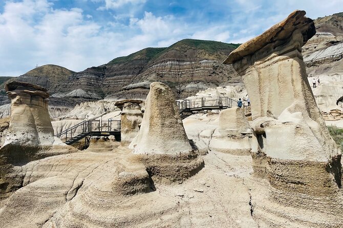 Day of Dinosaurs & Hoodoos from Calgary to Drumheller Badlands - The World’s Largest Dinosaur is a quick, playful stop
