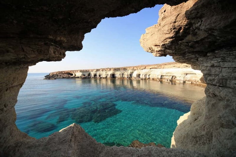 East Coast National Park: Half-Day Caves Jeep Safari - Sea caves, cliffs, and clear blue water