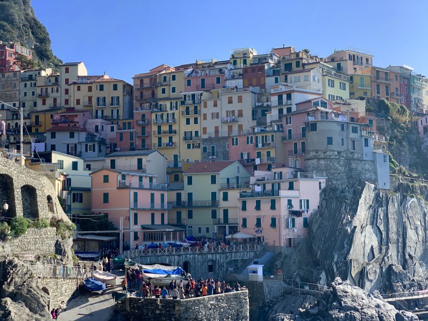 Florence: Cinque Terre Day Trip with Optional Street Food - Manarola, the first colorful stop