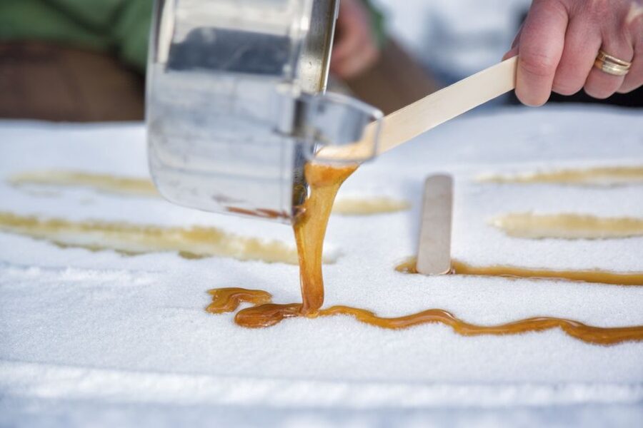 From Banff: Snowshoeing Tour in Kootenay National Park - Maple taffy, hot chocolate, and a crazy carpet