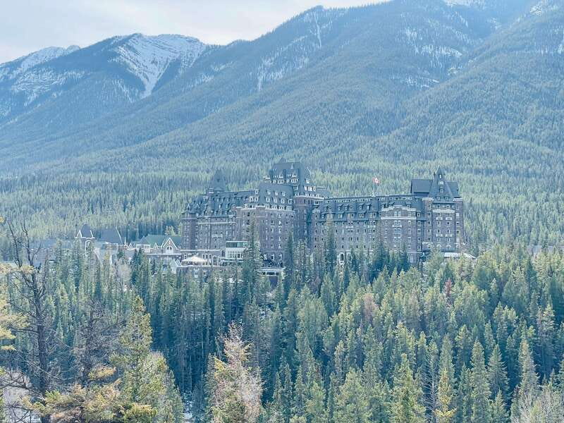 From Calgary: Banff, Moraine Lake and Lake Louise Tour - Bow Falls adds movement to the route