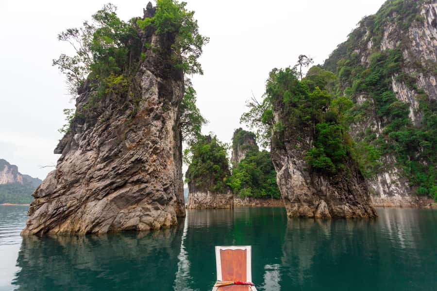 From Khao Lak/Khao Sok: Cheow Lan Lake and Emerald Pool Tour - The long-tail boat across Cheow Lan Lake