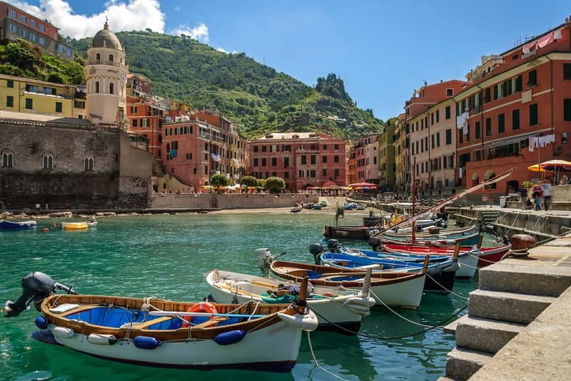 From La Spezia: Cinque Terre Small Group Tour with Limoncino - Riomaggiore: boats, harbor views, and a shorter visit