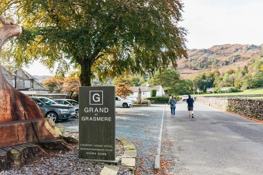 From Manchester: Lake District Bus Tour & Windermere Cruise - Coniston Water and the road through Cumbria