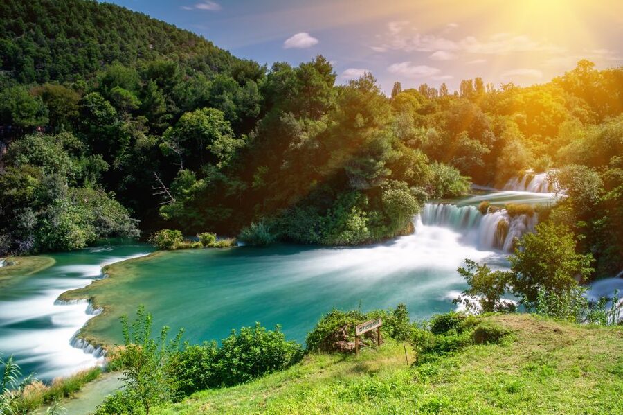 From Omiš: Krka Waterfalls and Trogir Group Tour - Entering Krka National Park