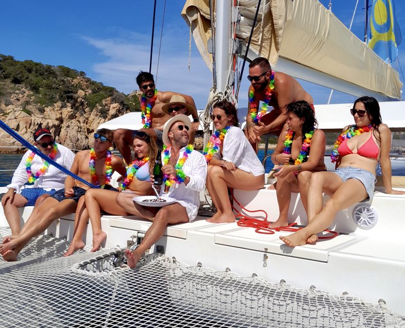 From Palau: Maddalena Archipelago Catamaran Tour with Lunch - Swimming and snorkeling in clear Sardinian water