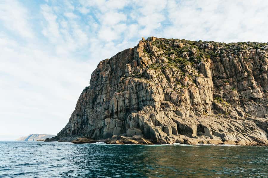 From Port Arthur: Tasman Island Wilderness Cruise - Sailing beneath Cape Pillar’s sheer walls
