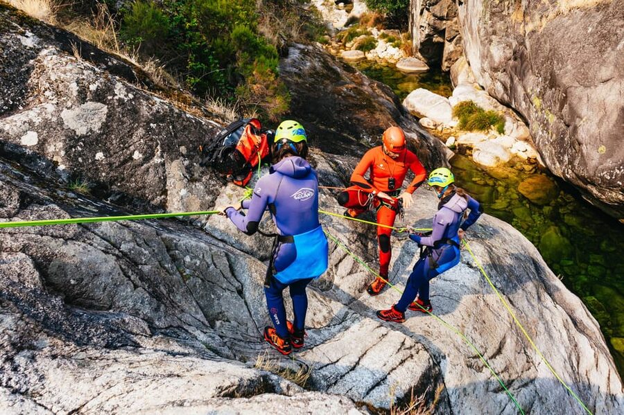 From Porto: Gerês National Park Canyoning Trip - Slides, jumps, zip lines, and abseiling