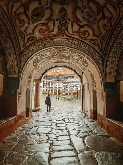 From Sofia: Rila Monastery & Melnik Day Tour - Entering Rila Monastery’s Frescoed Courtyard