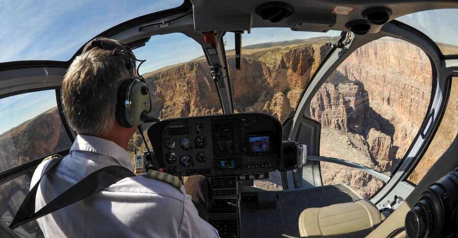 From South Rim: Grand Canyon Spirit Helicopter Tour - The flight begins above the Kaibab National Forest