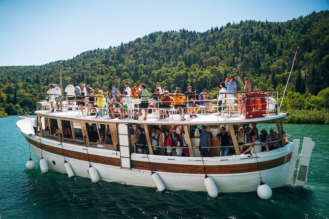 From Split: Krka Waterfalls Tour, Boat Cruise & Swimming - The boat ride adds a welcome change of pace