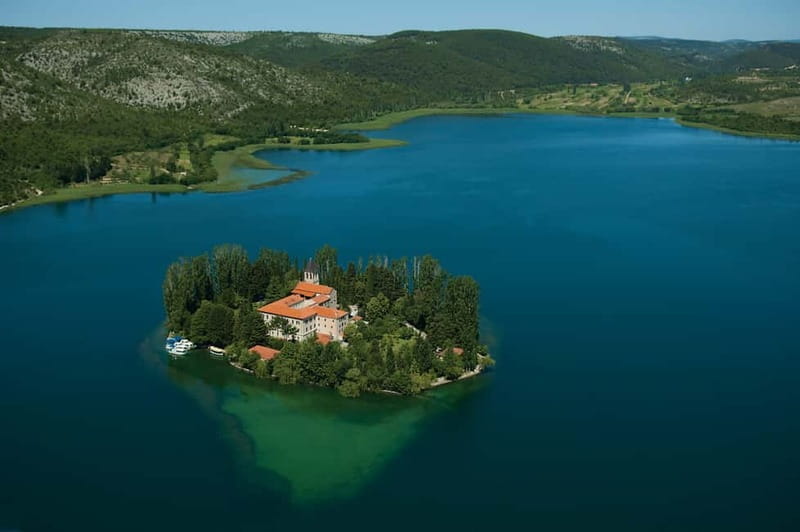 From Split/Trogir: Private Krka Waterfalls and Trogir Tour - Walking through Krka National Park