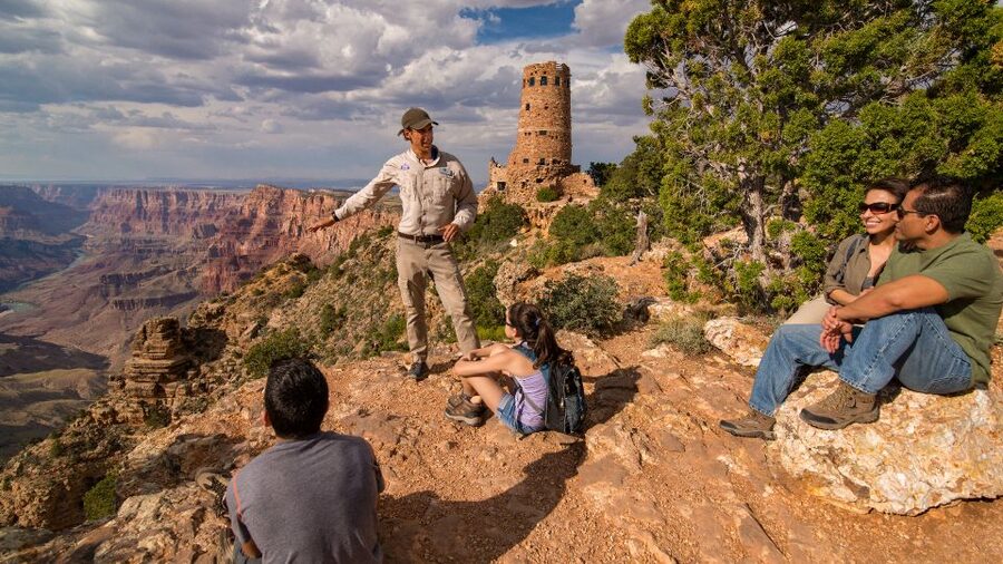From Tusayan: Grand Canyon Desert View Sunset Tour - Riding the open-air pink Jeep