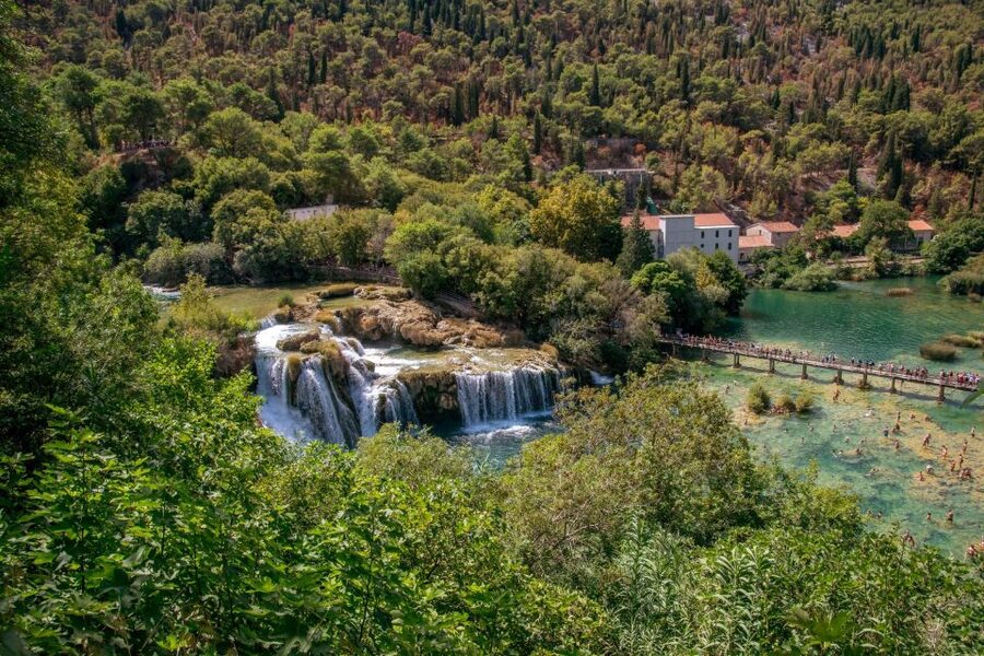 From Zadar: Krka National Park and Waterfalls Day Trip - Arriving by boat at Skradinski Buk