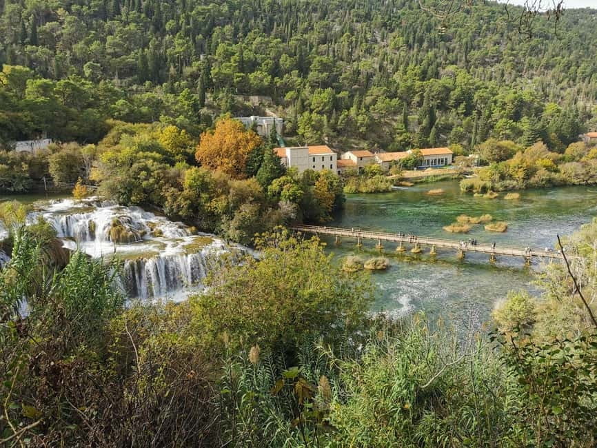 From Zadar: Krka Waterfalls Day Tour with Boat Ride & Guide - Walking the park paths in about two hours