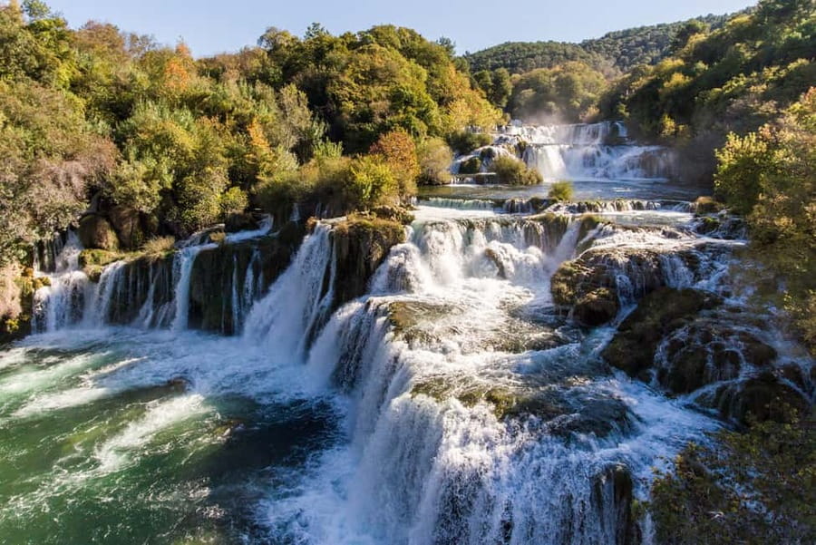 From Zadar: Krka Waterfalls Tour with Panoramic Boat Ride - The panoramic boat ride through the park