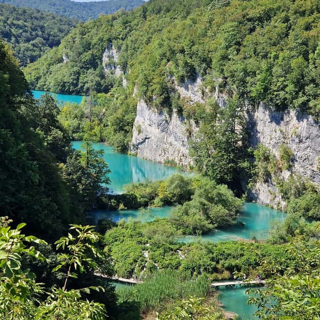 From Zadar: Plitvice Lakes Guided Tour with Boat & Train - The two-hour ride and Macola break