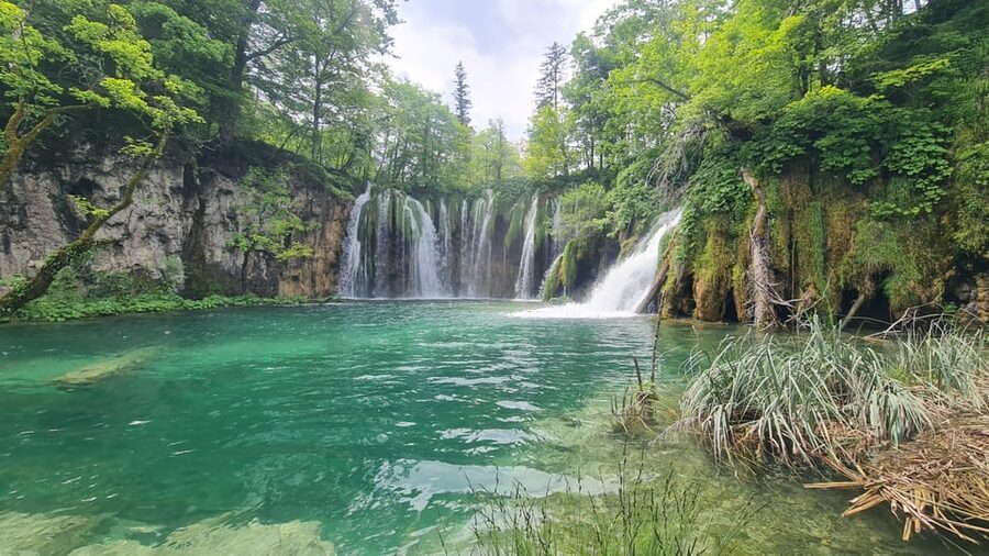 From Zadar: Plitvice Lakes Guided Tour with Boat & Train - The waterfalls and 16 connected lakes