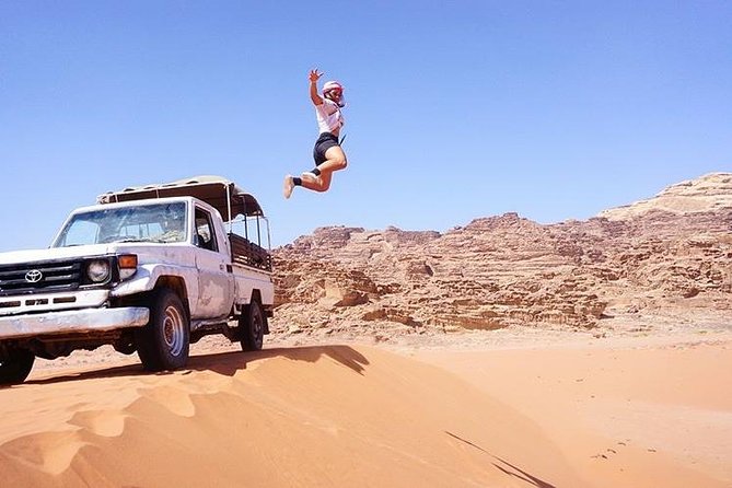 Half-Day Jeep Safari "Wadi Rum Highlights!" w/ Professional Bedouin Guide - Canyons, caves, and rock bridges