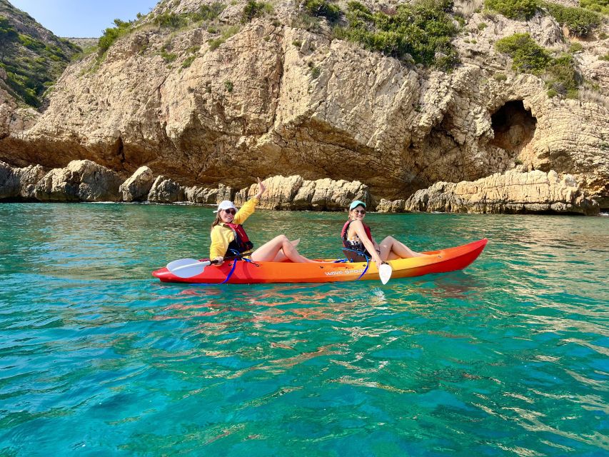 Jávea: Cala Tango and San Antonio Nature Reserve Kayak Tour - Cala Tango: rocks, snorkeling, and the optional jump