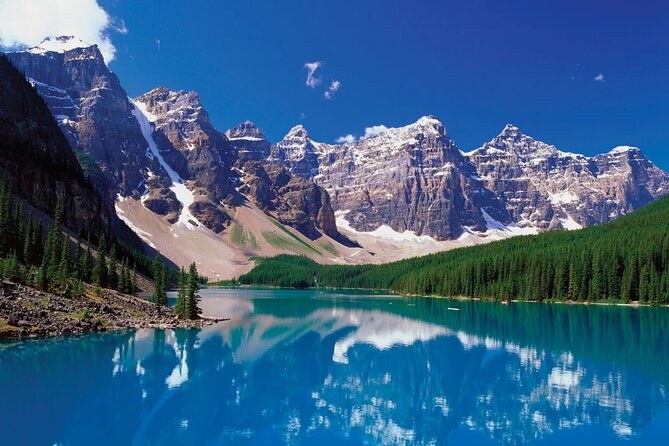 Lake Louise Moraine Lake Day Trip from Banff Calgary Canmore - Natural Bridge shows the force of the Kicking Horse River