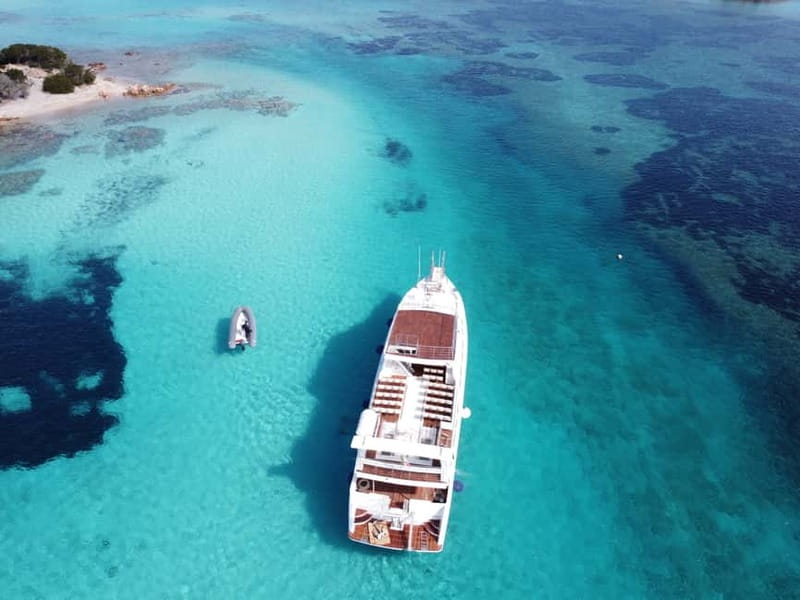 Palau: La Maddalena Archipelago Boat Tour with 4 Stops - Leaving Palau and crossing toward Spargi