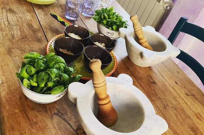 Pasta, Pesto and Tiramisu class Riomaggiore, Cinque Terre - Grinding seven ingredients into pesto alla Genovese