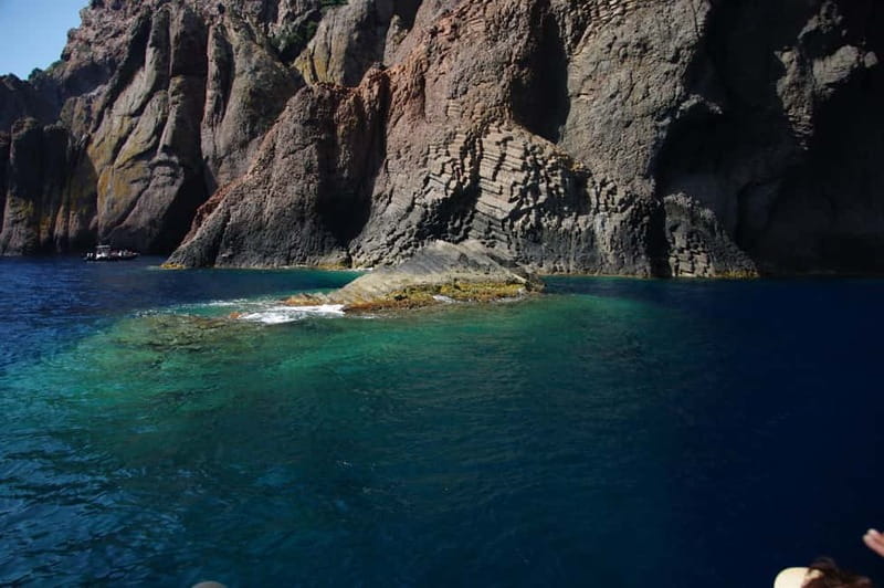 Porto: Scandola Nature Reserve and Creeks of Piana Boat Tour - Reading the red rock at the creeks of Piana