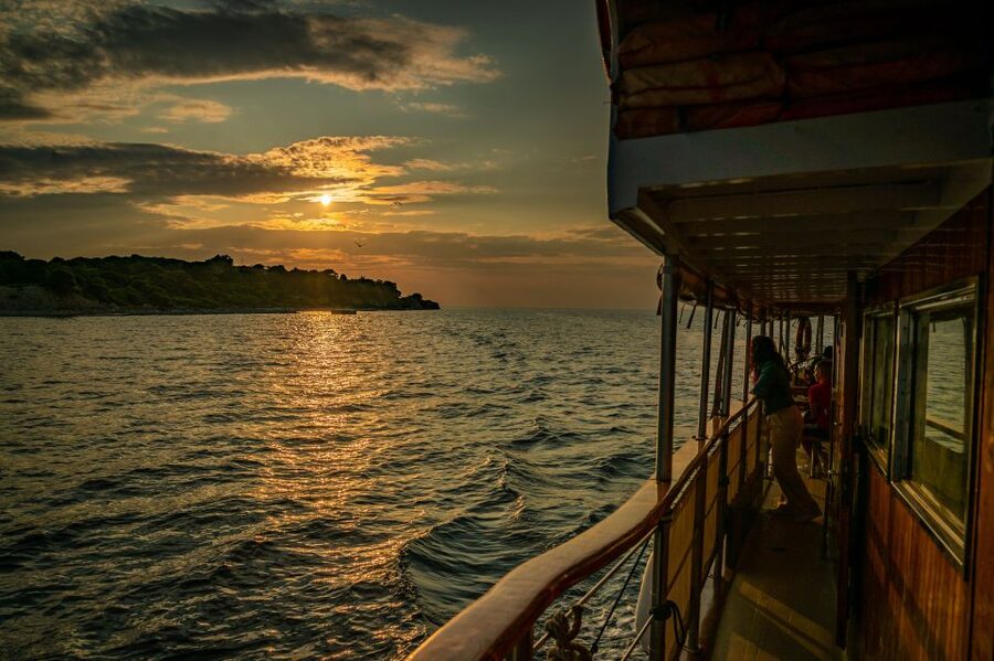 Pula: Brijuni National Park Sunset, Dolphins & Dinner Cruise - Sunset over the Adriatic