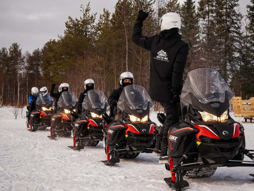 Rovaniemi: Guided Wilderness Snowmobile Safari & Barbeque - Getting dressed for a Finnish winter ride