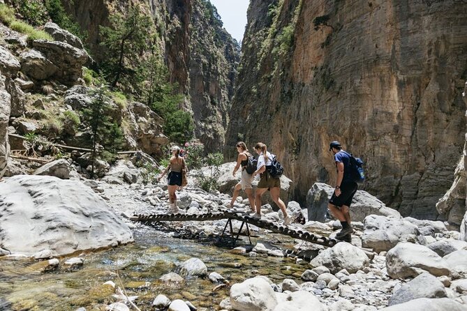 Samaria Gorge Trek: Full-Day Excursion from Chania with Guide - Starting downhill through forest and stone