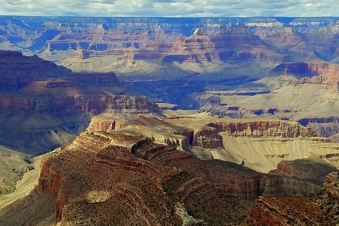 Small-Group Grand Canyon Complete Tour from Sedona or Flagstaff - Sunset Crater shows Arizona in black and red