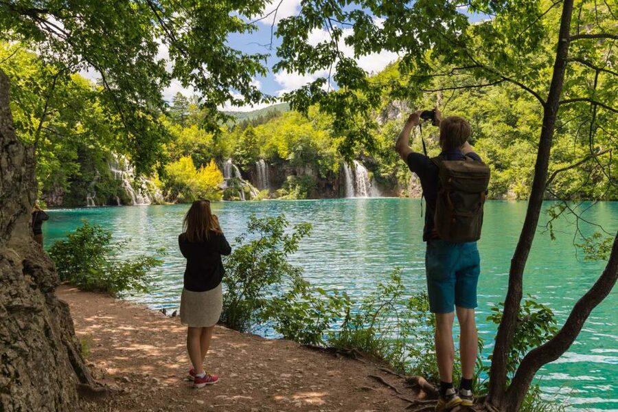Split: Plitvice Lakes Guided Day Tour with Entry Tickets - The boat ride toward the Lower Lakes