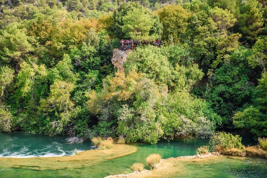 Split/Trogir: Krka National Park Day Trip & Boat to Skradin - A 30-minute boat ride through the canyon
