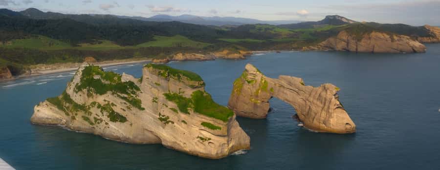 Takaka: Farewell Spit/Abel Tasman Scenic Flight - Crossing Separation Point toward Abel Tasman