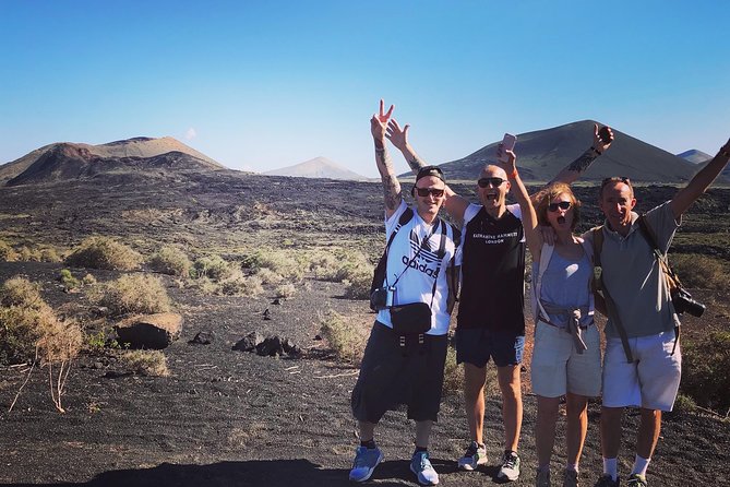 Volcano Trekking Tour (Timanfaya eruptions) - Lava fields, rock colors, and signs of life