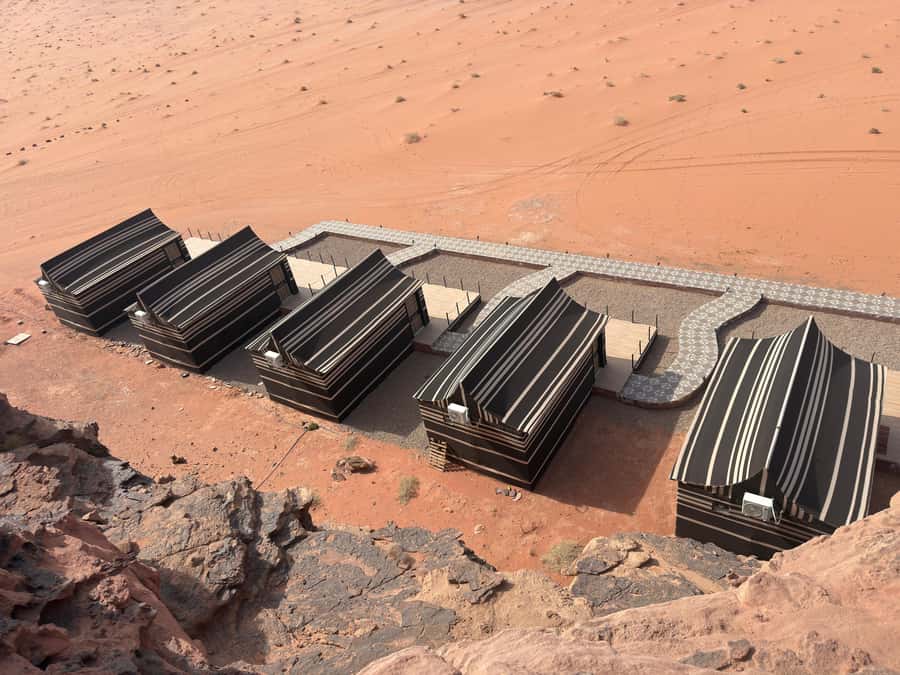 Wadi Rum: Bedouin Camp Stay,Full-Day Desert Tour with 3Meals - Meeting your Bedouin guide in Wadi Rum