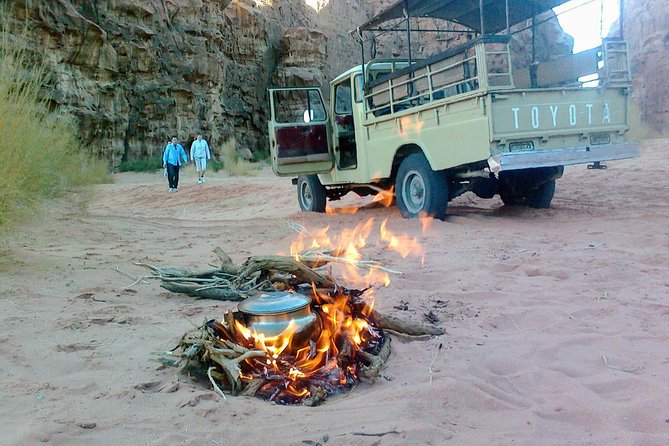 Wadi Rum Jeep Tour & Camp; Overnight - Riding into Wadi Rum on shaded benches
